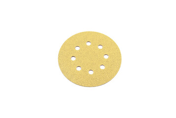 Yellow sanding disc with eight holes.