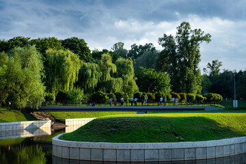 Fototapeta premium Central park with a lake. Beautiful park. Rest at nature
