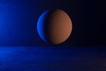 Concrete ball as abstract space concept. Cement sphere against wall geometric idea