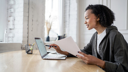 Female manager student online learning education uses laptop workplace