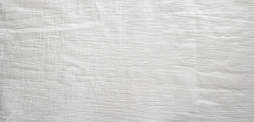 wrinkled natural linen white fabric, top view, textile background