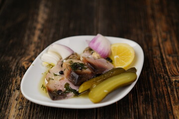 Turkish appetizer (meze) Lakerda with olive oil and pickle. Lakerde made with tunny fish. Delicious appetizer, healthy. 
