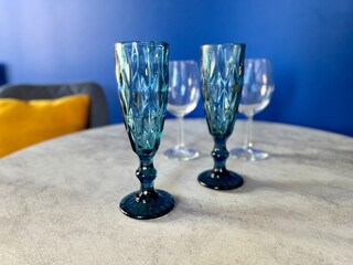 A set of elegant glasses laid out on the dining table 