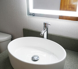 close up on ceramic sink in bathroom