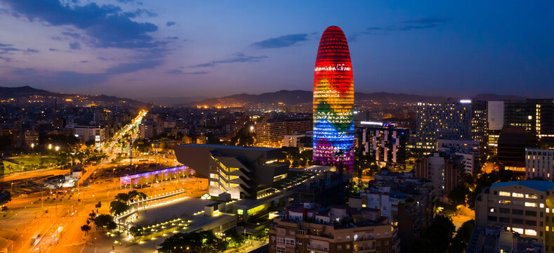 Night aerial view of business skyscraper Torre Glories in Barcelona