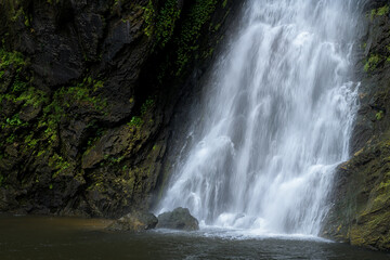 Fototapeta na wymiar Beautiful waterfall in deep forest at Thailand.