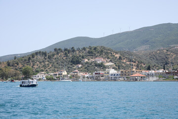 Fototapeta na wymiar Beautiful view of sea with boat and coastal city
