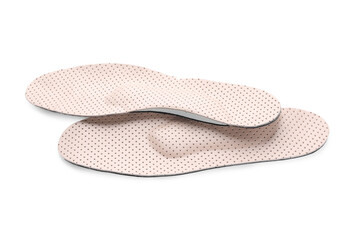 Beige comfortable orthopedic insoles isolated on white