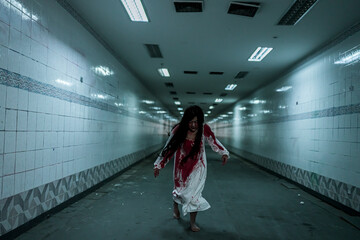 Girl ghost woman death with blood the horror is screaming darkness and nightmare dark background,...