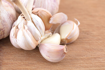 Fresh garlic still life on cutting board