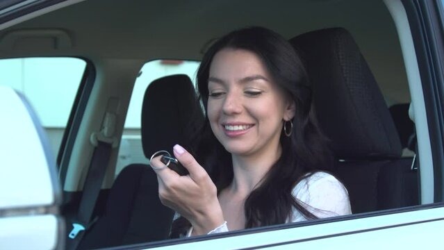 Young woman takes a forgotten missed car key, thanks and apologize.