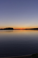 Naklejka na ściany i meble Sunset at Astotin Lake in Elk Island National Park