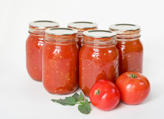 Fototapeta na wymiar Home Canned, Home Grown, Organic, Crushed Tomatoes on White