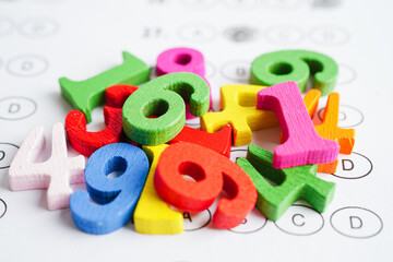 Number wood block cubes for learning Mathematic, education math concept.