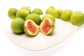 fresh figs on a white plate