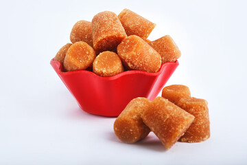 Organic Gur or Jaggery Powder and cubes, Jaggery is used as an ingredient in sweet and savoury dishes in the cuisines of India.