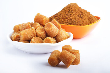 Organic Gur or Jaggery Powder and cubes, Jaggery is used as an ingredient in sweet and savoury dishes in the cuisines of India.