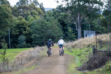 woman walking on a path and track in tasmania australia