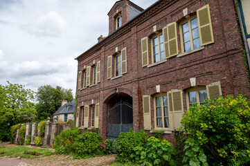 Fototapeta premium One of most beautiful french villages, Gerberoy - small historical village with half-timbered houses and colorful roses flowers, France