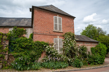 One of most beautiful french villages, Gerberoy - small historical village with half-timbered houses and colorful roses flowers, France