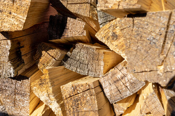 A lot of split firewood close-up. Selective focus