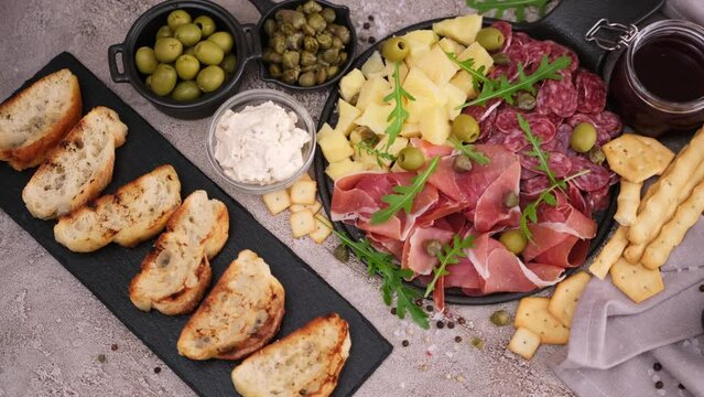 meat and cheese plater and bruschetta grilled bread