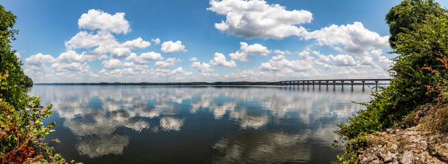 Photographed on a beautiful cloudy day, the historic route called The Natchez Trace crosses a bridge over the Tennessee River near the sight where Colbert Ferry operated close to Cherokee, Alabama. - 521936164