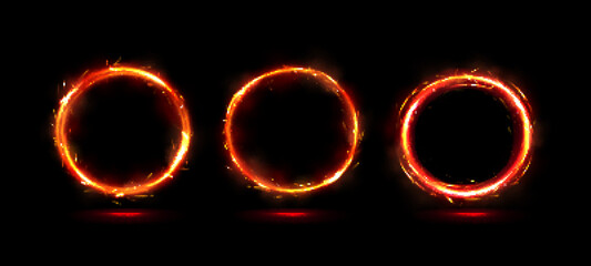 Fire rings, burning circle frames with glow and sparks isolated on black background. Vector realistic set of orange and red flame round traces, abstract circular flashes
