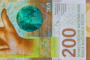 Macro shot of two hundred swiss francs banknote