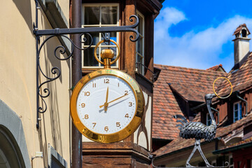 Fototapeta na wymiar Close-up of big clock on the building in Switzerland