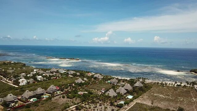 Watamu Beach resort with beautiful scenery of calm seaside during sunny day in Kenya - aerial drone