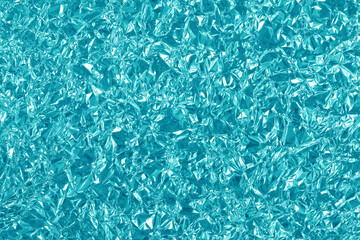 Light blue gold foil shiny texture, wrinkled wrapping paper for background and design art work.