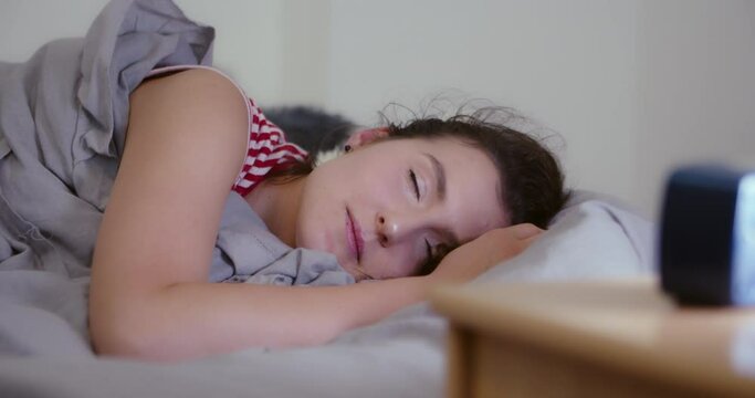 Sleeping girl in morning, satisfied face closeup, slider view, resting is important