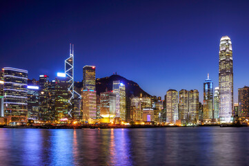 Fototapeta na wymiar Hong Kong financial district city skyline across Victoria Harbor at night