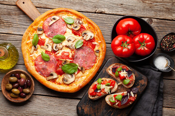 Italian cuisine. Pizza and toasts
