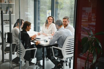 Group of young people in business meeting