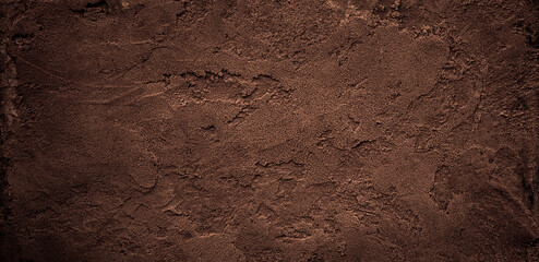 Dark chocolate brown sugar-like grainy texture background