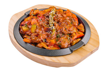 pan with vegetable stew on wooden board