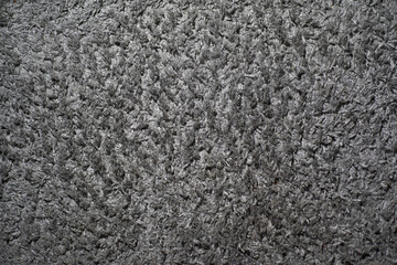 Gray texture of a lush carpet