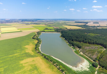 a small artificial lake built against floods in the downstream towns