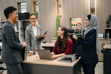  Young business creative team are brainstorming planning discussing while in creative business discussing work very happy in the office