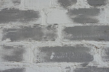 Texture of old whitewashed gray brick wall
