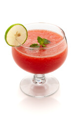 Close-up of organic fresh chilled Watermelon juice garnished with min leaf in studio light.