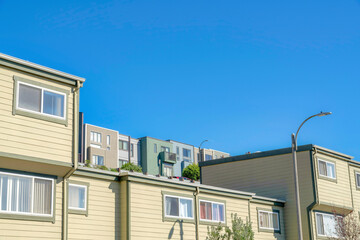 Fototapeta na wymiar Apartment buildings in a low angle view at San Francisco, California