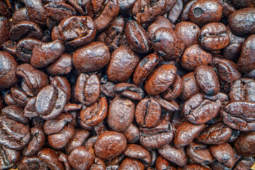 An extreme close up of roasted coffee beans