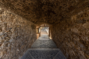 Tunnel in an old stone wall around the ancient city of Tarraco (current day Tarragona, Spain)