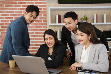Business Asian people in formal suit meeting and working together in modern workspace.