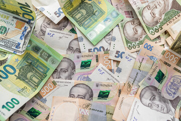 set of hryvnia dollar and euro banknotes as business background. Money saving concept