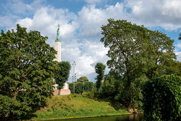 Obraz premium Riga, Latvia. August 10, 2022. The Freedom Monument in Riga, Latvia. The memorial honours the soldiers killed during the Latvian War of Independence in 1918-1920. Summer day by the monument.