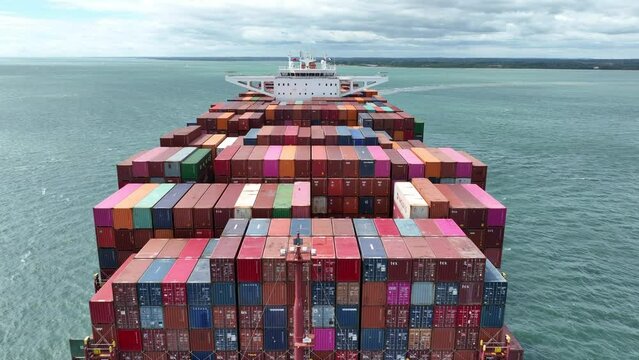 Fully Loaded Container Ship at Sea Transporting Cargo Around the World